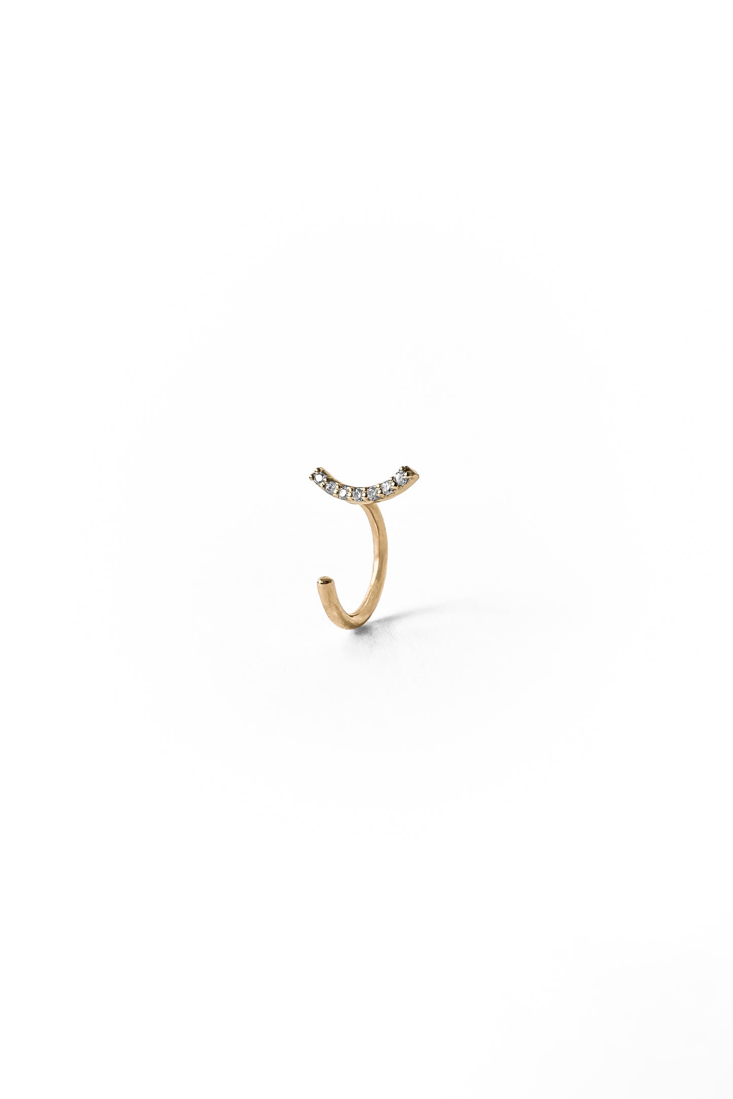Curved diamonds gold piercing