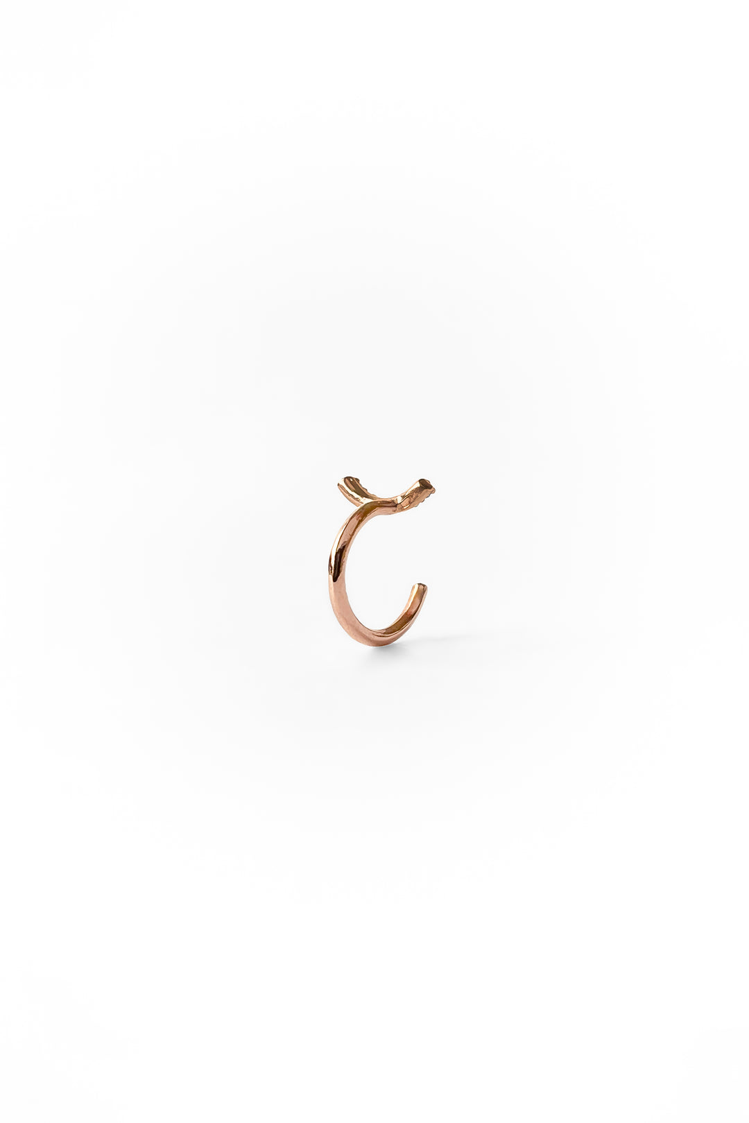 Curved diamonds gold piercing