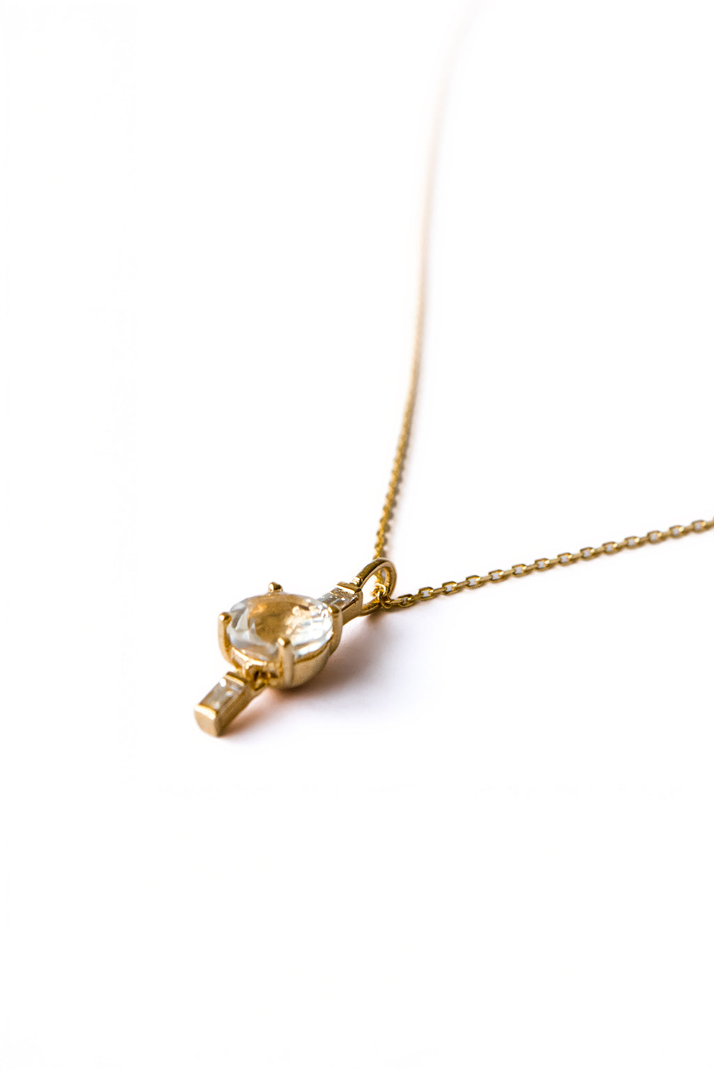 Drop Baguettes Gold Necklace in 18k yellow gold with diamonds and a 5 mm topaz, designed by Sansoeurs.