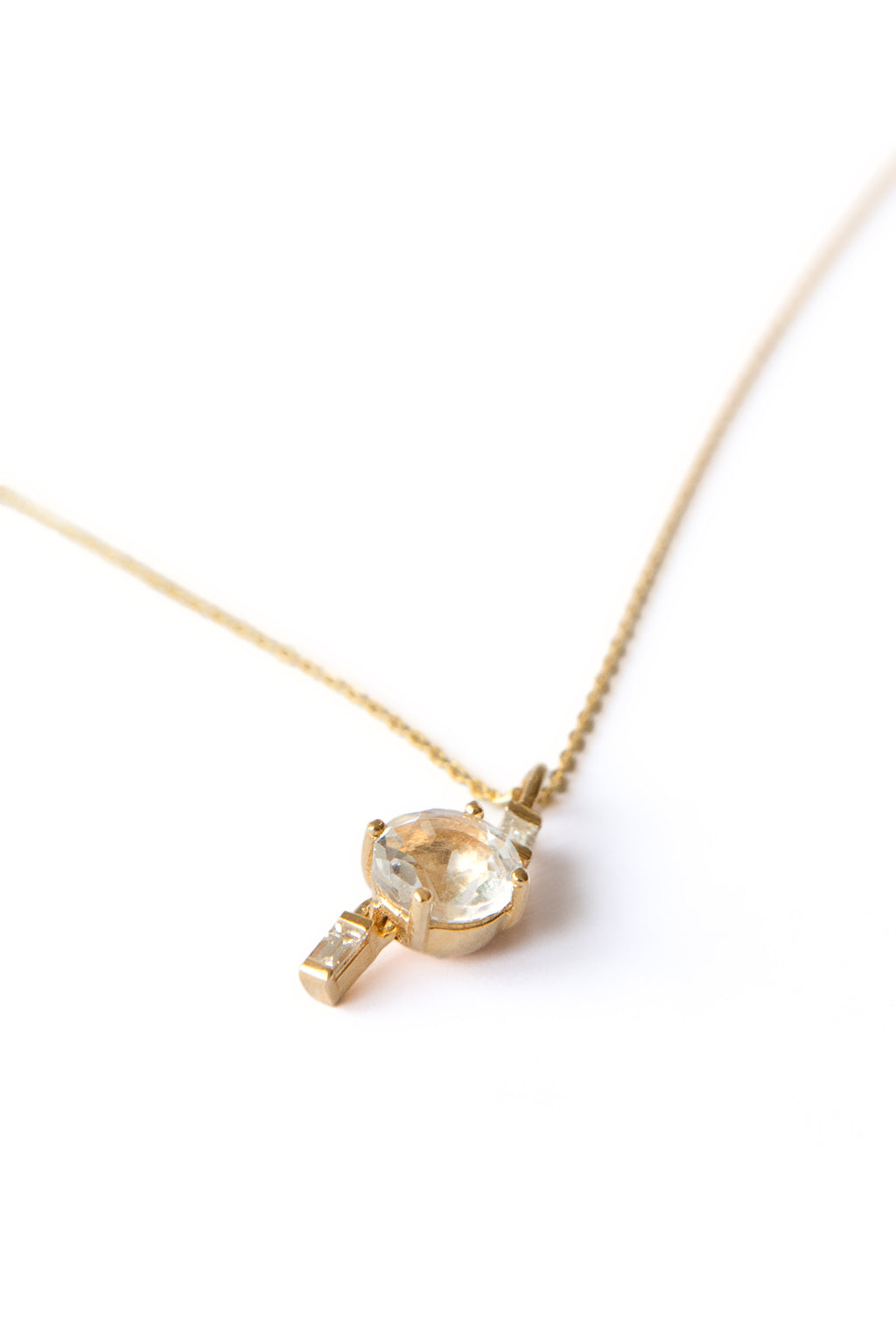 Drop Baguettes Gold Necklace in 18k yellow gold with diamonds and a 5 mm topaz, designed by Sansoeurs.