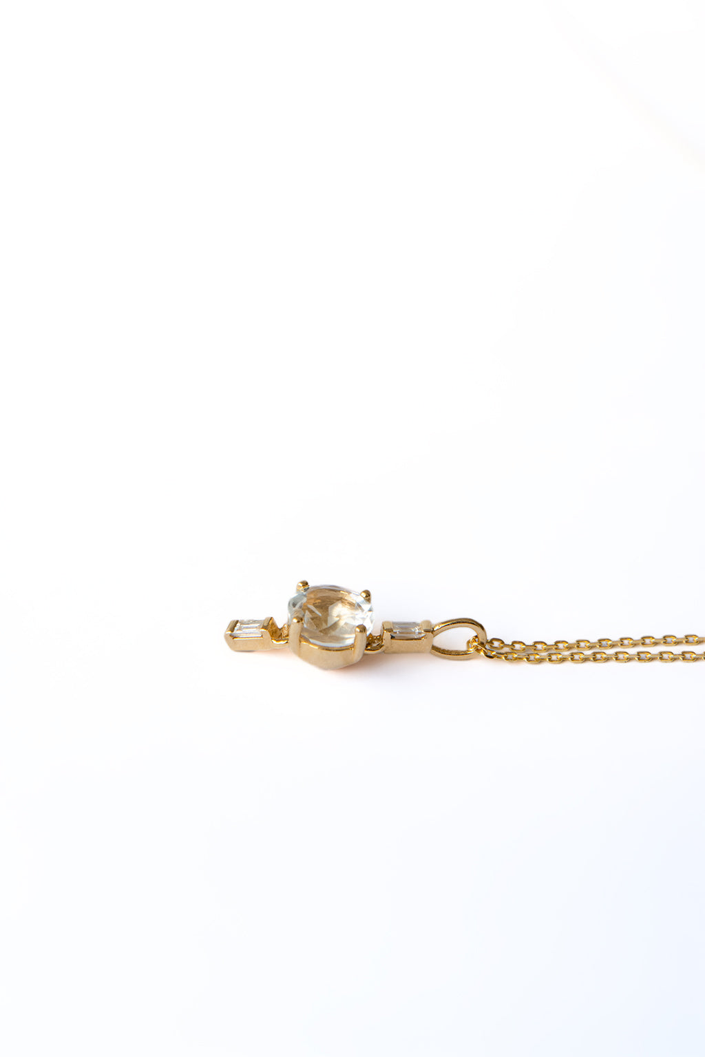 Drop Baguettes Gold Necklace in 18k yellow gold with diamonds and a 5 mm topaz, designed by Sansoeurs.