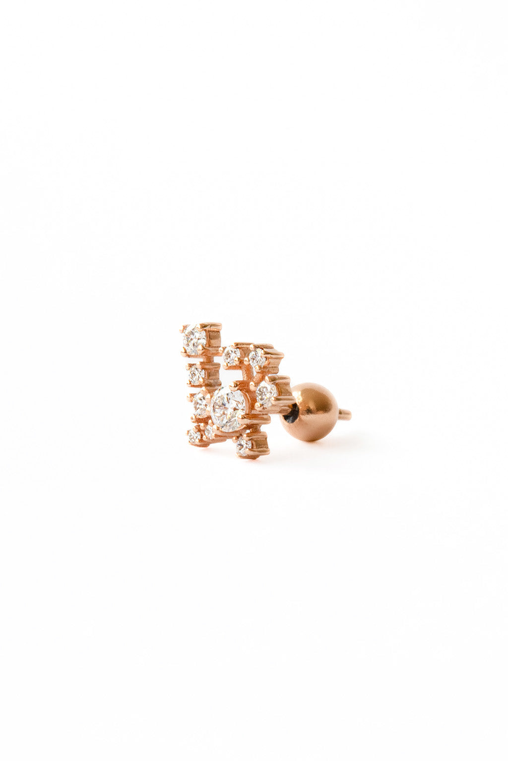 Star cascade earring in 18k rose gold with diamonds, close-up view
