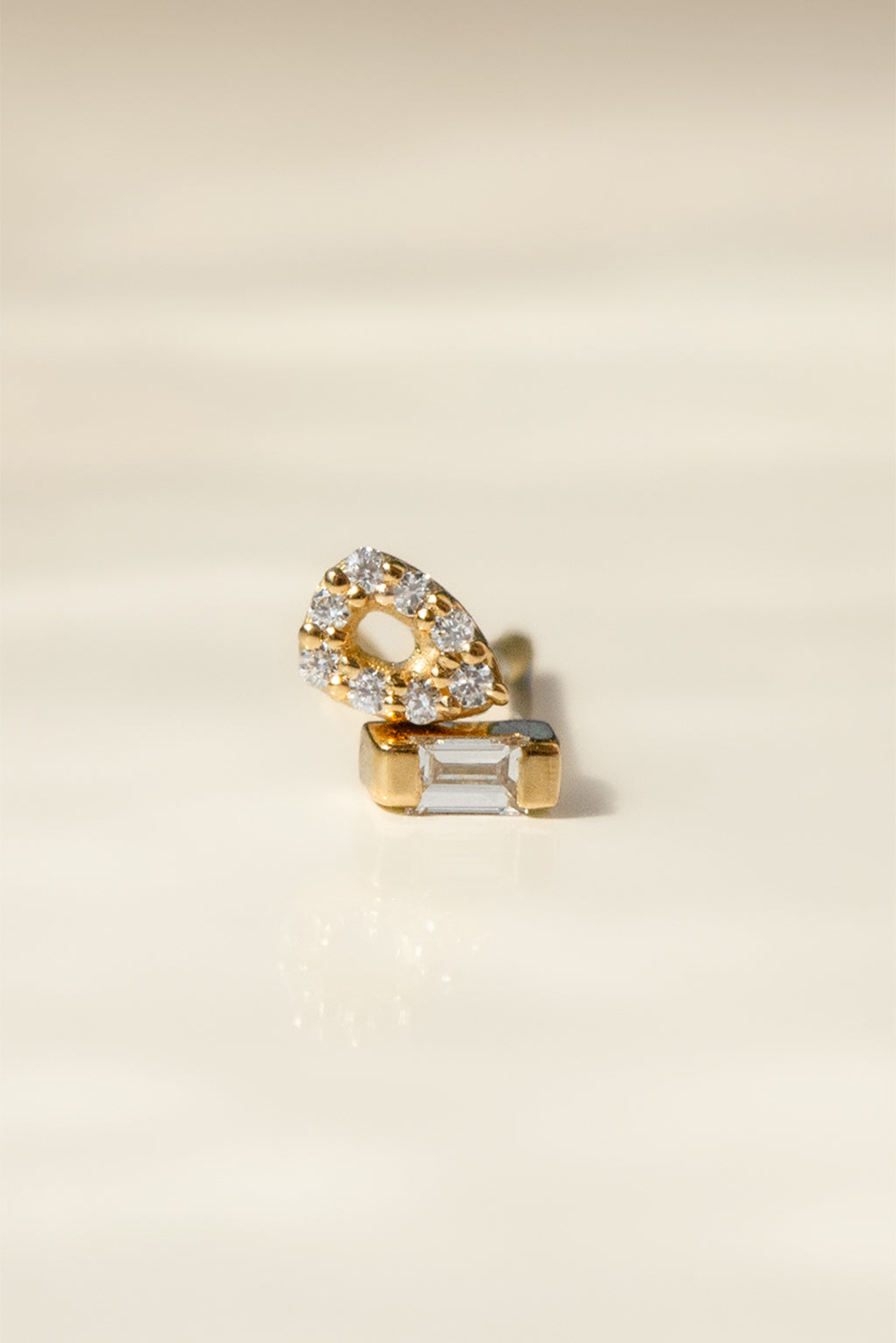 Baguette gold and diamond and Bubbles gold and diamonds baby earrings by Sansoeurs, diamond set between two small gold plates