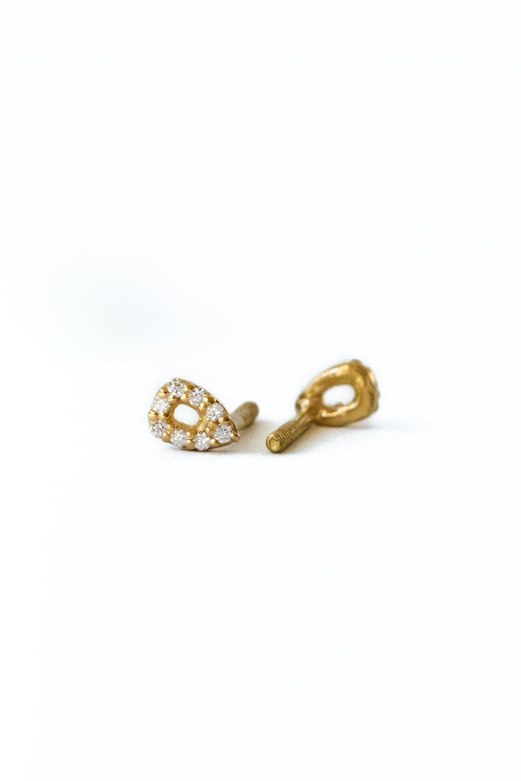 Bubbles gold and diamonds baby earrings by Sansoeurs, drop-shaped studs with diamonds