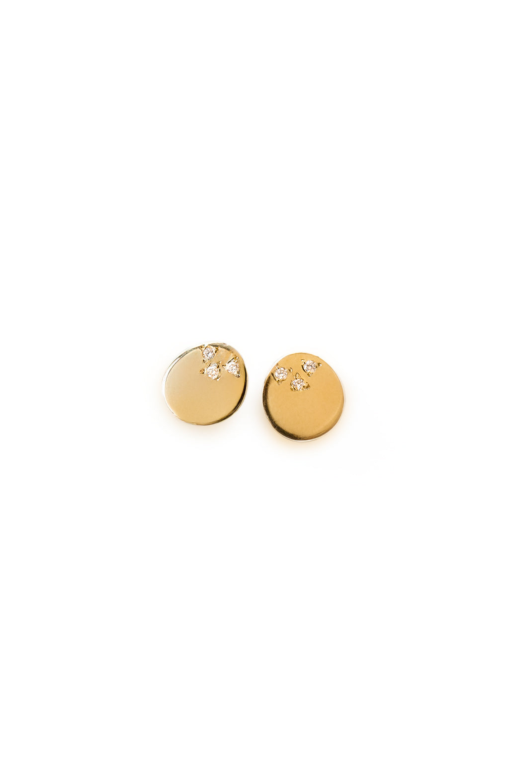 Dots gold and diamonds baby earrings by Sansoeurs, oval gold studs with three diamonds