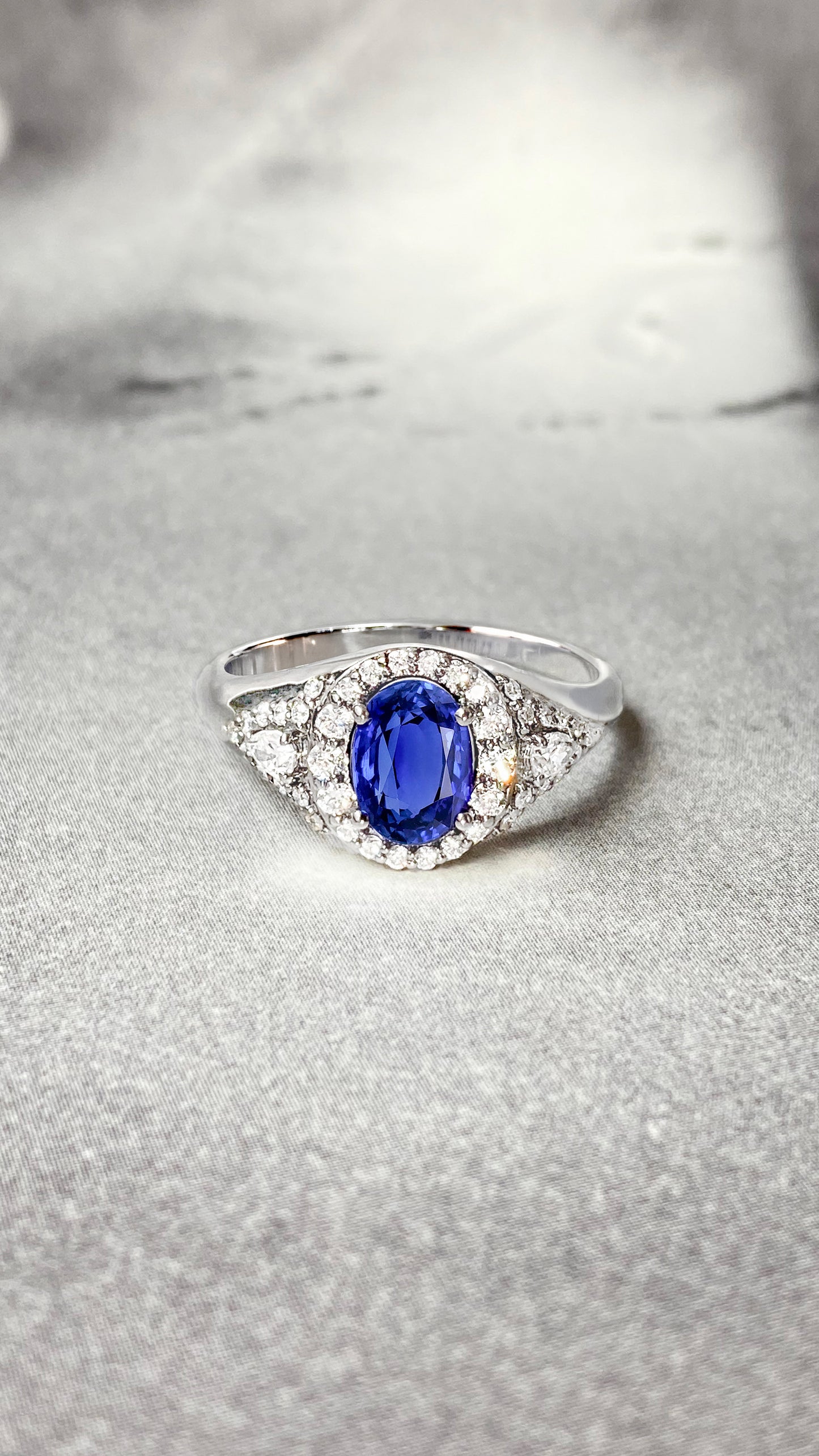 Signet sapphire white 18k gokd ring with diamonds front portrait