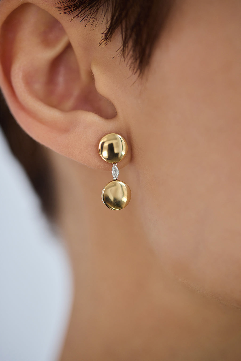 Double Sun gold earring