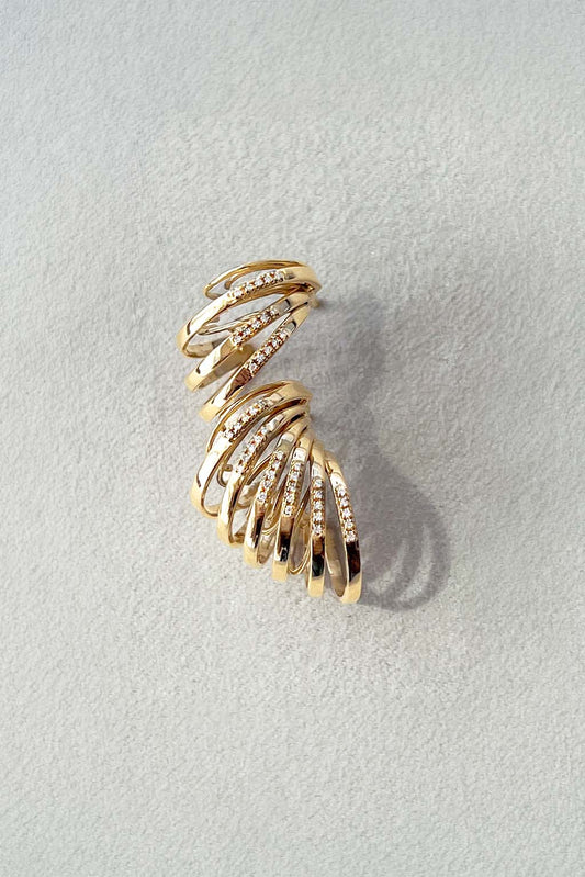 Big Étoile de Sansoeurs and Étoile de Sansoeurs earrings in 18k gold with diamonds
