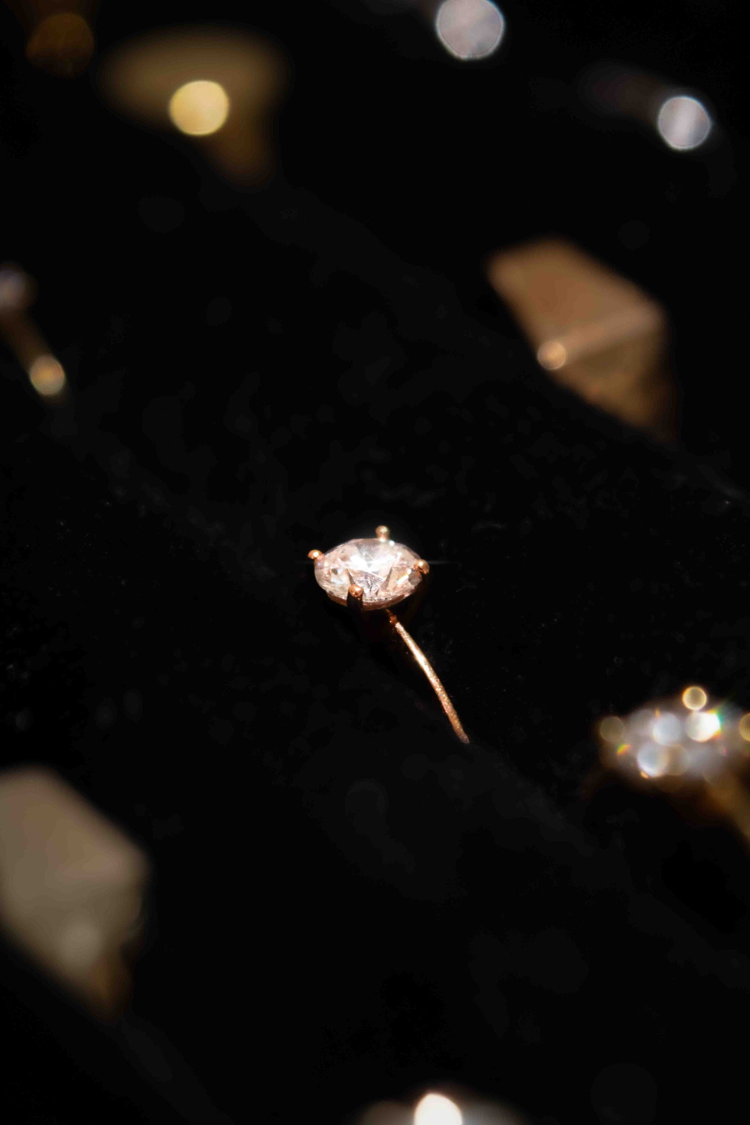 Close-up of handcrafted gold ring with diamonds from Sansoeurs Black Friday sale.