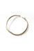 Gold oval bracelet with matte finish on white background