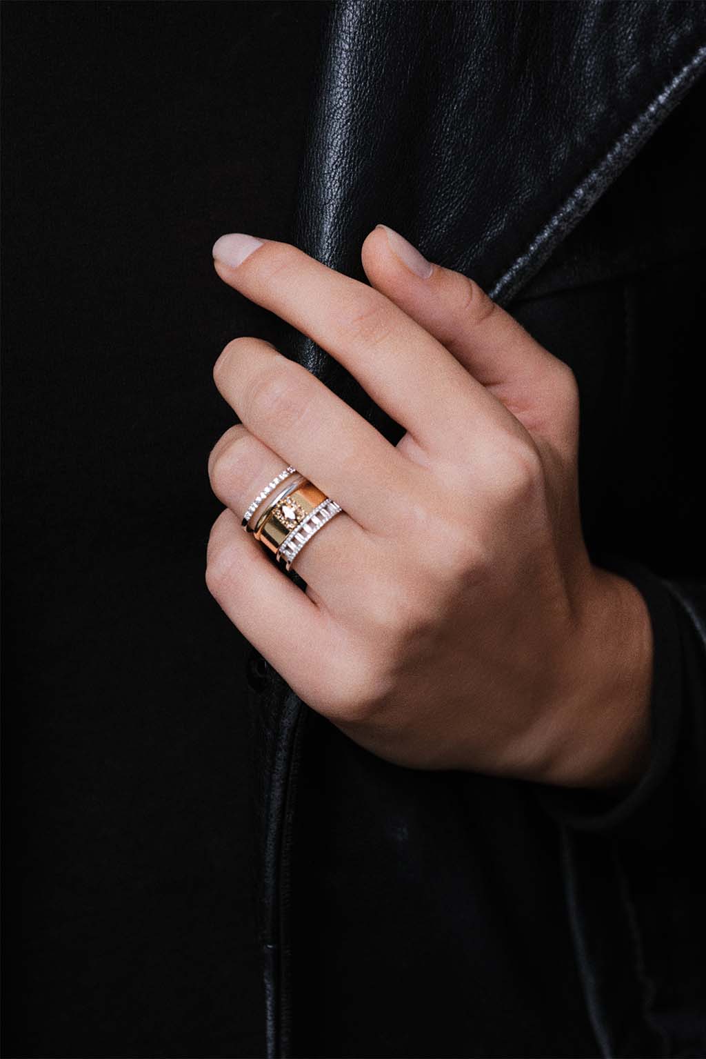 Marquise Brown Diamonds Band Ring in 18k yellow gold with brown diamonds, handcrafted by Sansoeurs, worn on model’s hand.
