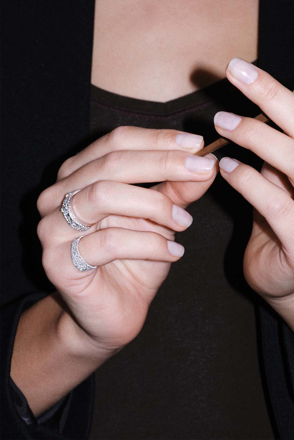 Irregular Full Band Diamonds Ring in 18k gold with diamonds, handcrafted by Sansoeurs, worn on model’s hand.
