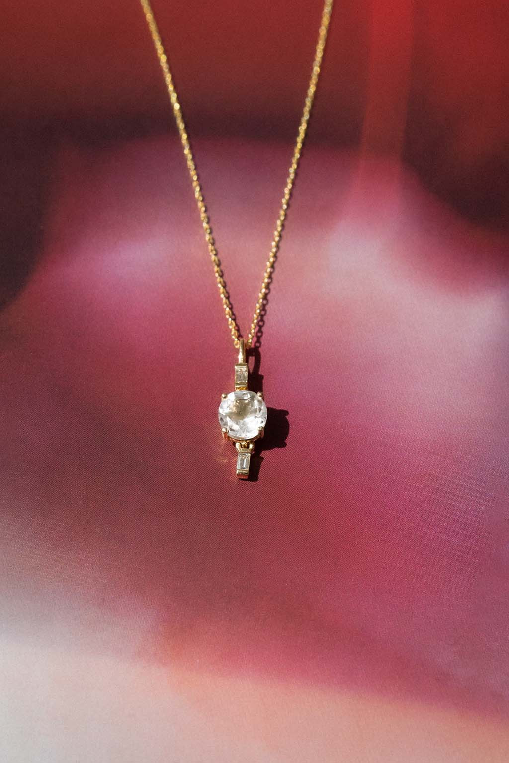 Drop Baguettes Gold Necklace in 18k yellow gold with diamonds and a 5 mm topaz, designed by Sansoeurs.