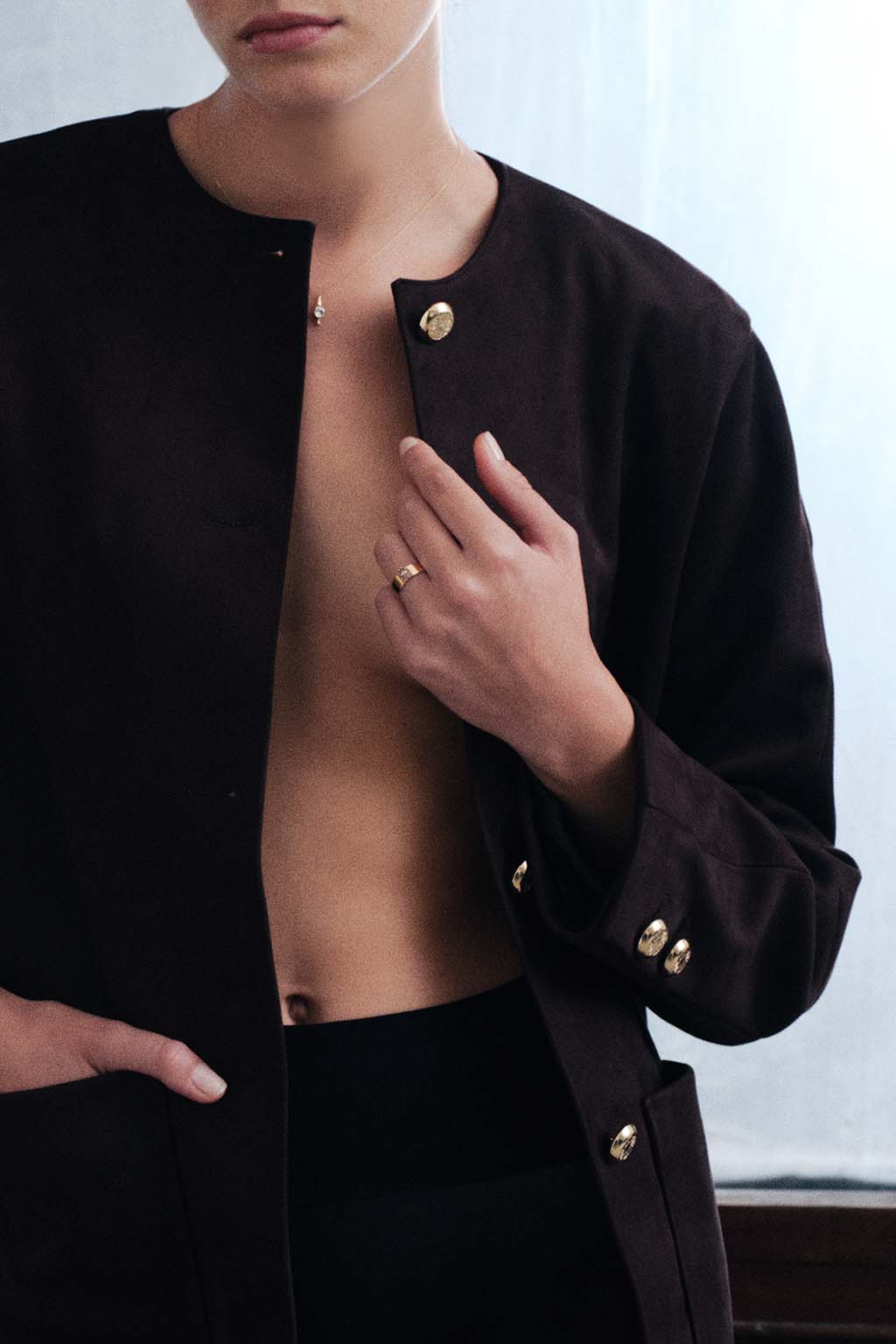 Marquise Brown Diamonds Band Ring in 18k yellow gold with brown diamonds, handcrafted by Sansoeurs, worn on model’s hand.