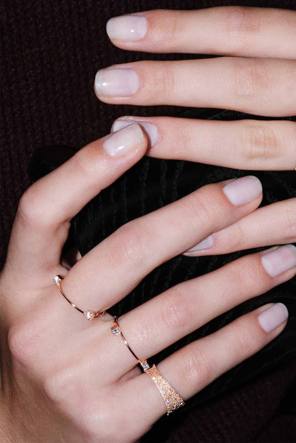 Irregular Full Band Diamonds Ring in 18k gold with diamonds, handcrafted by Sansoeurs, worn on model’s hand.

