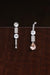 Long Wife Morganite Gold Earring in 18k white gold with diamonds, topaz and morganite, designed by Sansoeurs.
