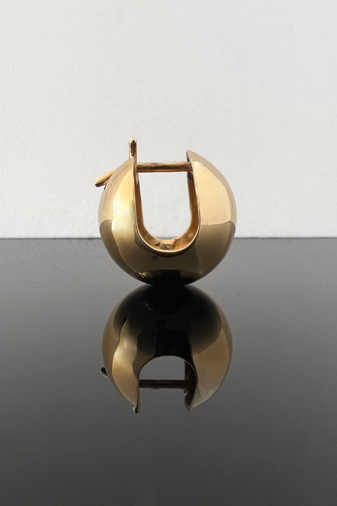 Sphere gold earring