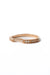 Irregular 18k gold ring with sculptural finish on white background