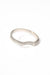 Irregular 18k gold ring with sculptural finish on white background