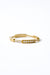 Moi-Moi ring in 18k gold with repeated segments, front view