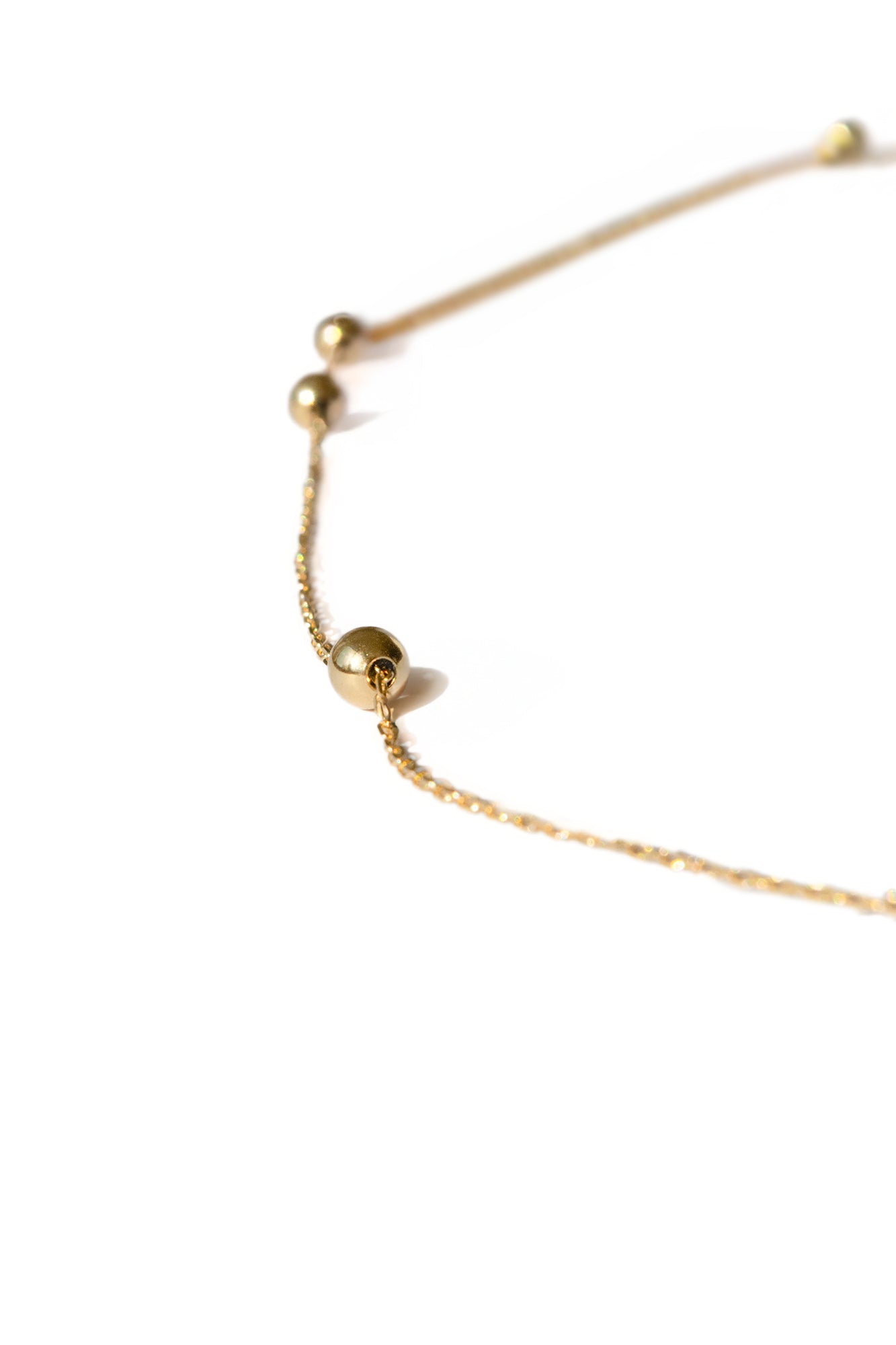 18K gold necklace with five adjustable mini spheres on a 50 cm chain – luxury handcrafted jewelry by Sansoeurs