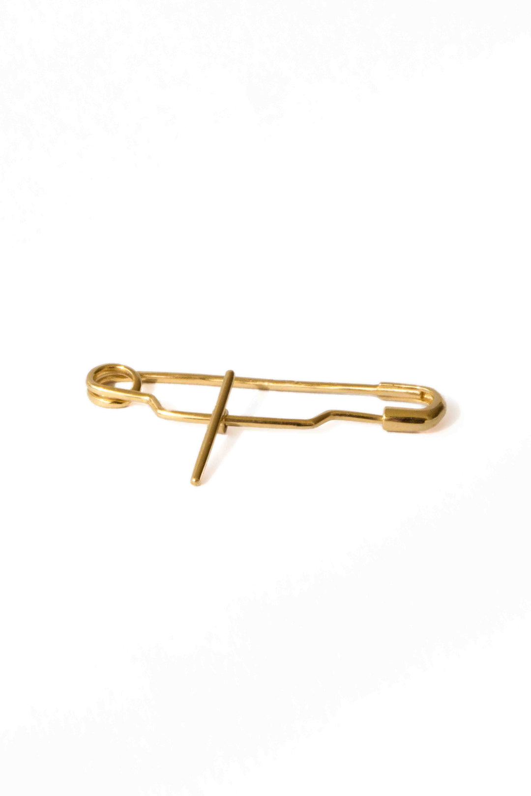 Baby Pin in 18k yellow gold by Sansoeurs, shown closed, bespoke design for a christening day.