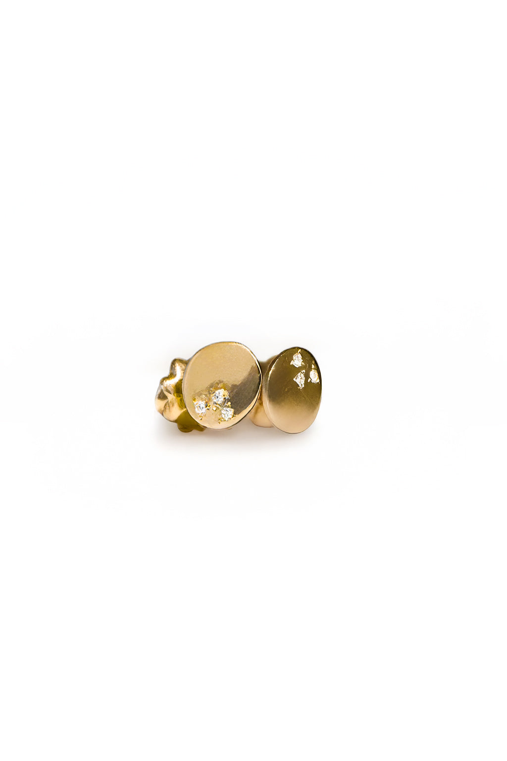 Dots gold and diamonds baby earrings by Sansoeurs, oval gold studs with three diamonds