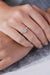 Sugar Signet Gold Ring in 18k gold with diamonds, handcrafted by Sansoeurs, worn on model’s hand.
