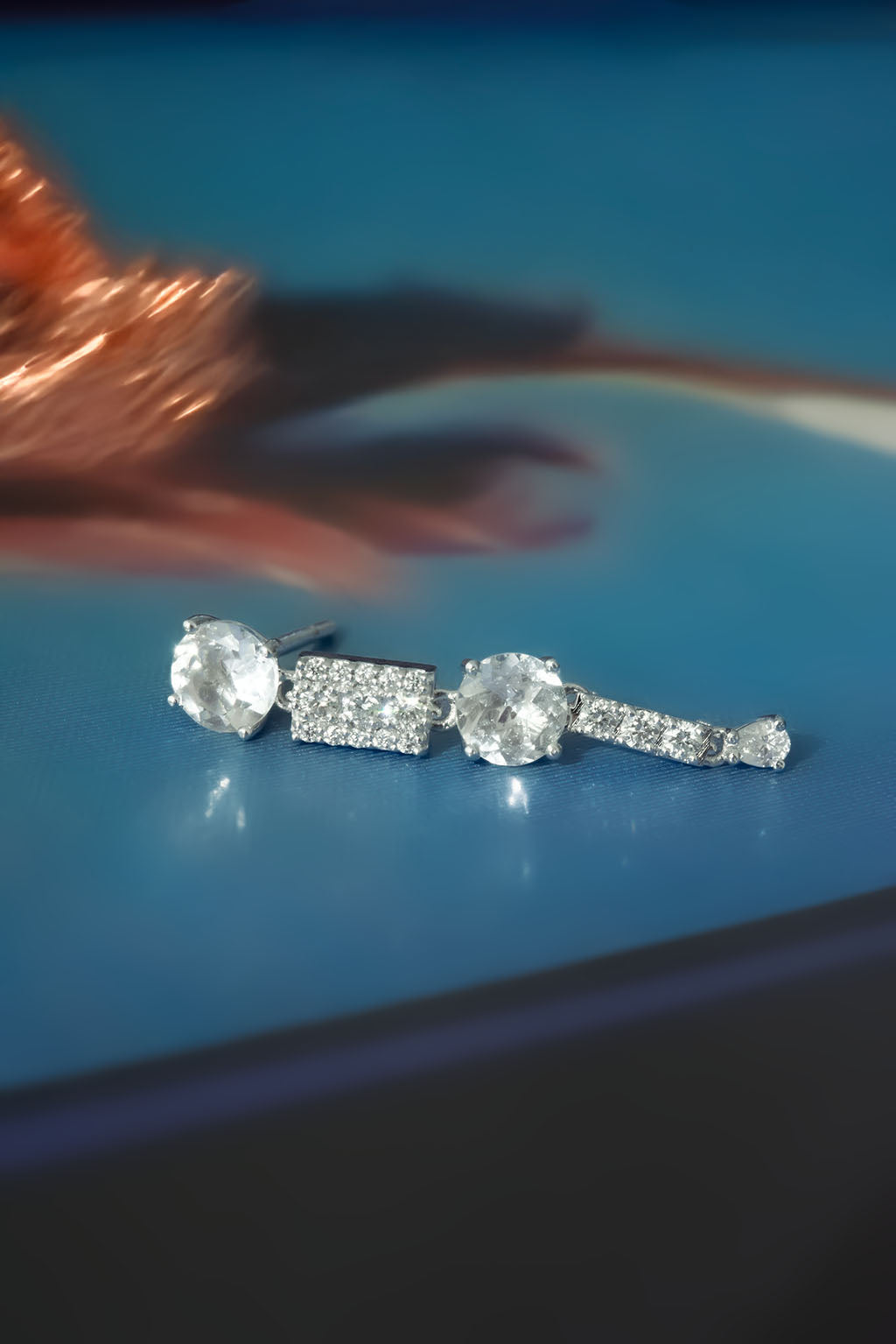 Topaz and Diamond Mobile earring in 18k white gold, with two topaz stones and diamonds designed by Sansoeurs.
