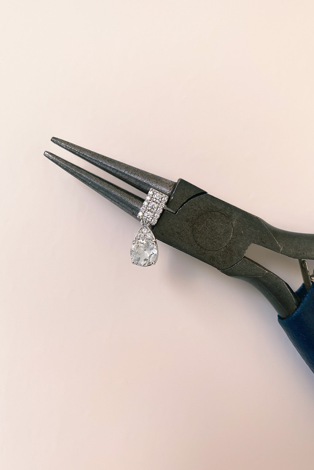 Topaz Small Drop Earring in 18k white gold with diamonds, featuring a 5 mm topaz, designed by Sansoeurs.