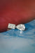 Topaz Small Drop Earring in 18k white gold with diamonds, featuring a 5 mm topaz, designed by Sansoeurs.