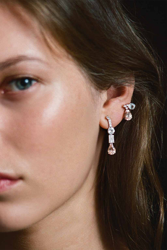 Long Wife Morganite Gold Earring in 18k white gold with diamonds, topaz and morganite, designed by Sansoeurs, worn on model.
