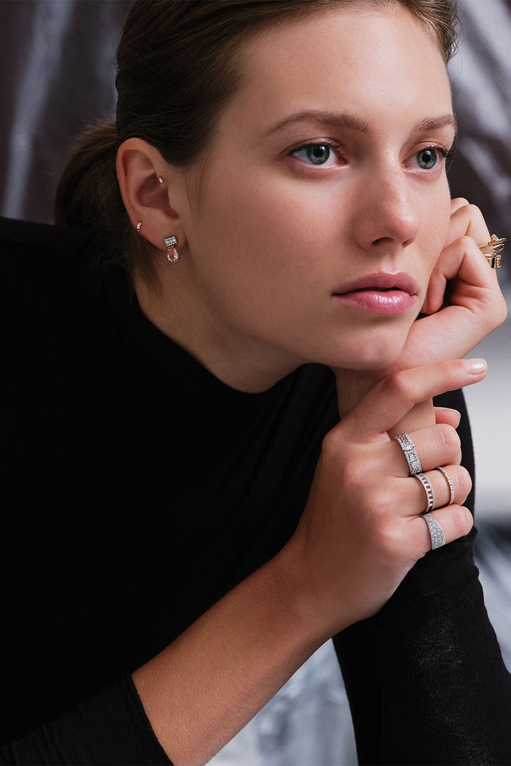 Model wearing the 18k white gold Wife Morganite earring by Sansoeurs, featuring morganite and G VS diamonds