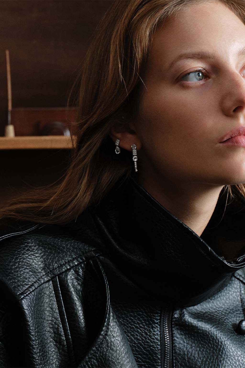 Model wearing the 18k white gold Wife Topaz earring by Sansoeurs, shown alongside the Long Wife Topaz design.