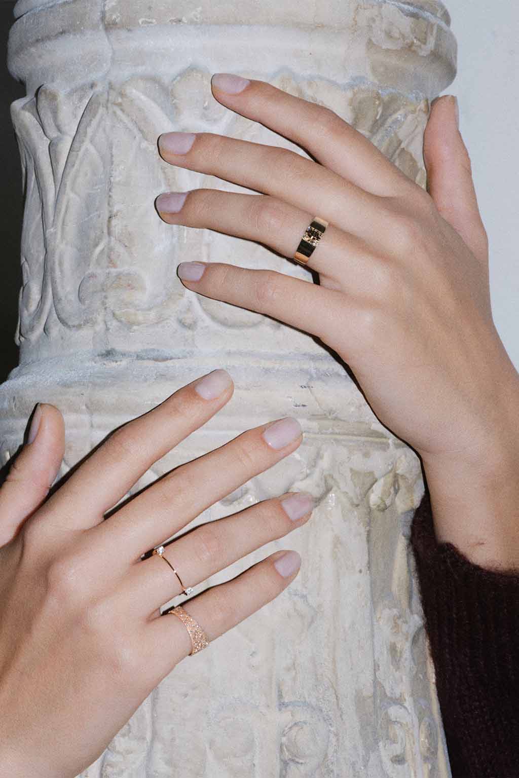Marquise Brown Diamonds Band Ring in 18k yellow gold with brown diamonds, handcrafted by Sansoeurs, worn on model’s hand.
