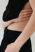 Sugar Signet Gold Ring in 18k gold with diamonds, handcrafted by Sansoeurs, worn on model’s hand.
