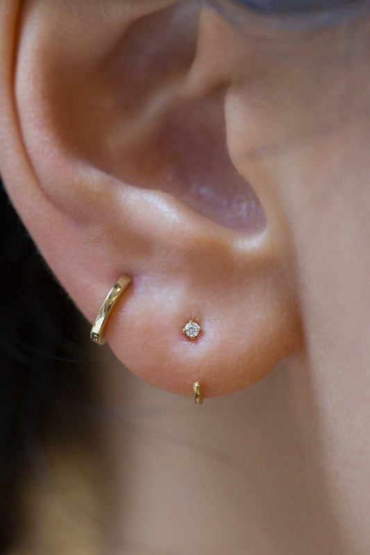 Piercing 4 Garras de oro y diamante