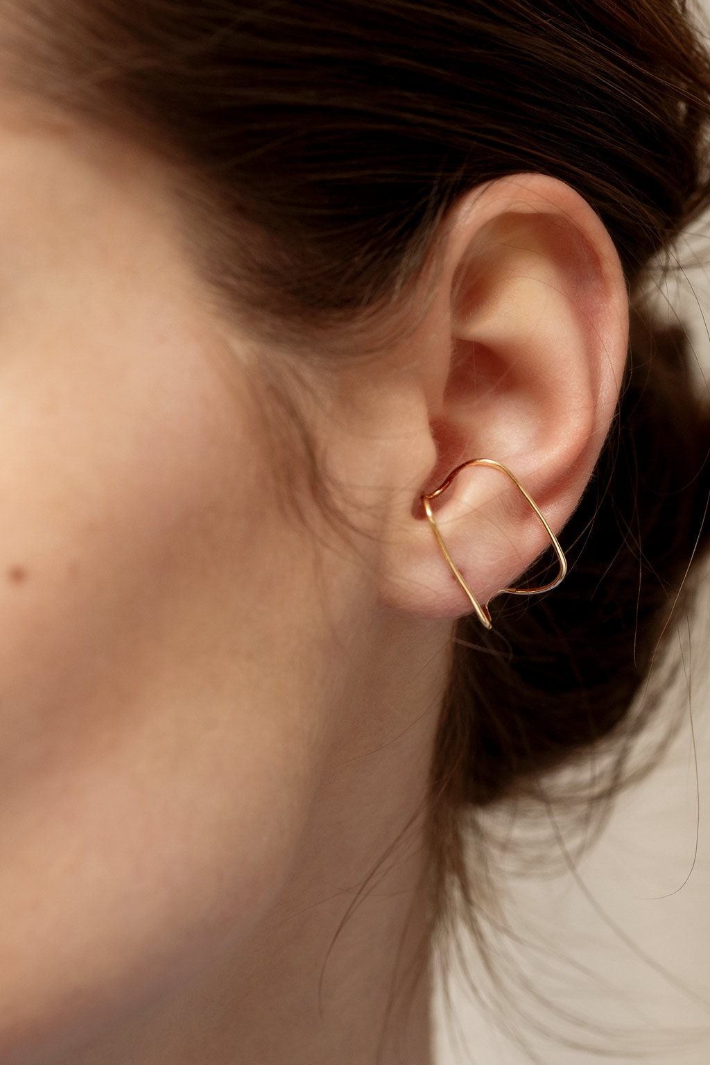 Open V gold earring